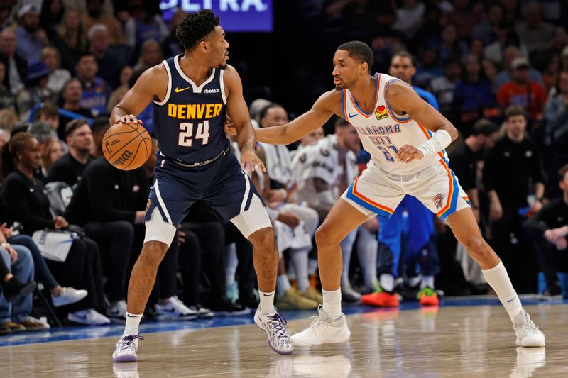 OKLAHOMA CITY, OK - MARCH 10: Jalen Pickett #24 of the Denver Nuggets dribbles the ball during the game against the Oklahoma City Thunder on March 10, 2025 at Paycom Center in Oklahoma City, Oklahoma. NOTE TO USER: User expressly acknowledges and agrees that, by downloading and or using this photograph, User is consenting to the terms and conditions of the Getty Images License Agreement. Mandatory Copyright Notice: Copyright 2025 NBAE (Photo by Martin McGrew/NBAE via Getty Images)