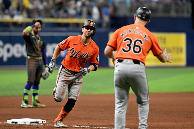 Aug 10, 2024; St. Petersburg, Florida, USA; Baltimore Orioles third baseman Ramon Urias (29) rounds third base after hitting a two run home run in the eighth inning against the Tampa Bay Rays at Tropicana Field. Mandatory Credit: Jonathan Dyer-USA TODAY Sports