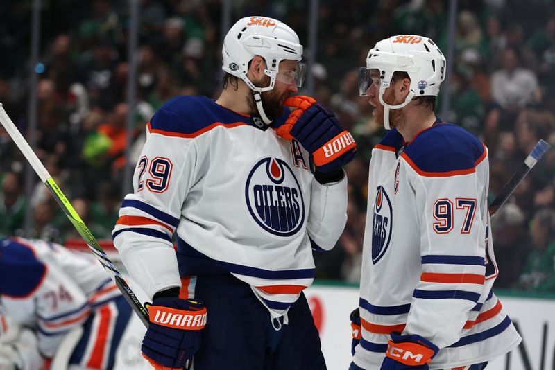 Oct 19, 2024; Dallas, Texas, USA; Edmonton Oilers center Leon Draisaitl (29) talks to center Connor McDavid (97) in the second period against the Dallas Stars at American Airlines Center. Mandatory Credit: Tim Heitman-Imagn Images