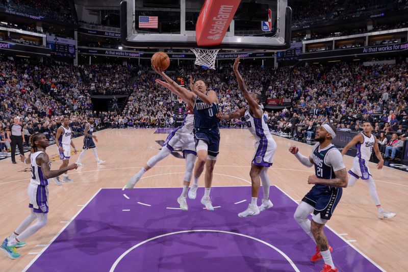 SACRAMENTO, CA - MARCH 29: Dante Exum #0 of the Dallas Mavericks goes to the basket during the game  on March 29, 2024 at Golden 1 Center in Sacramento, California. NOTE TO USER: User expressly acknowledges and agrees that, by downloading and or using this Photograph, user is consenting to the terms and conditions of the Getty Images License Agreement. Mandatory Copyright Notice: Copyright 2024 NBAE (Photo by Rocky Widner/NBAE via Getty Images)