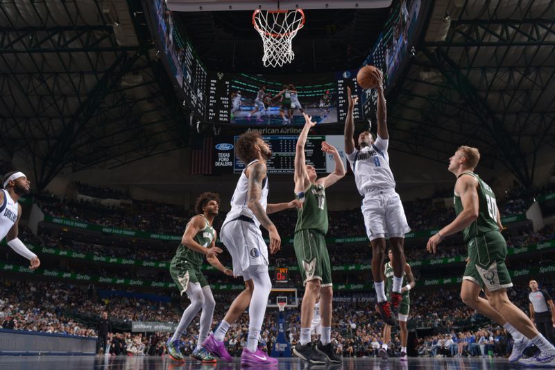 DALLAS, TX - OCTOBER 17: Olivier Maxence-Prosper #8 of the Dallas Mavericks drives to the basket during the game against the Milwaukee Bucks during a NBA preseason game on October 17, 2024 at American Airlines Center in Dallas, Texas. NOTE TO USER: User expressly acknowledges and agrees that, by downloading and or using this photograph, User is consenting to the terms and conditions of the Getty Images License Agreement. Mandatory Copyright Notice: Copyright 2024 NBAE (Photo by Glenn James/NBAE via Getty Images)