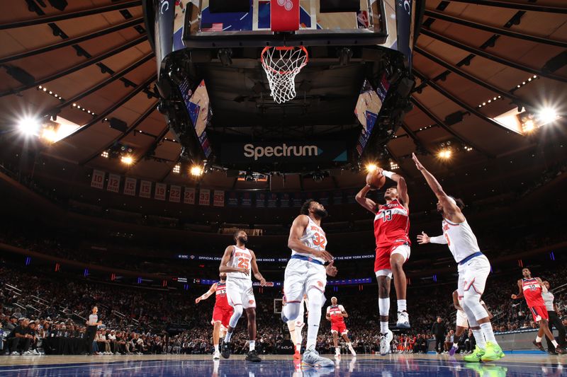 NEW YORK, NY - OCTOBER 9: Jordan Poole #13 of the Washington Wizards drives to the basket during the game against the New York Knicks during the 2024 NBA Preseason on October 9, 2024 at Madison Square Garden in New York City, New York.  NOTE TO USER: User expressly acknowledges and agrees that, by downloading and or using this photograph, User is consenting to the terms and conditions of the Getty Images License Agreement. Mandatory Copyright Notice: Copyright 2024 NBAE  (Photo by Nathaniel S. Butler/NBAE via Getty Images)