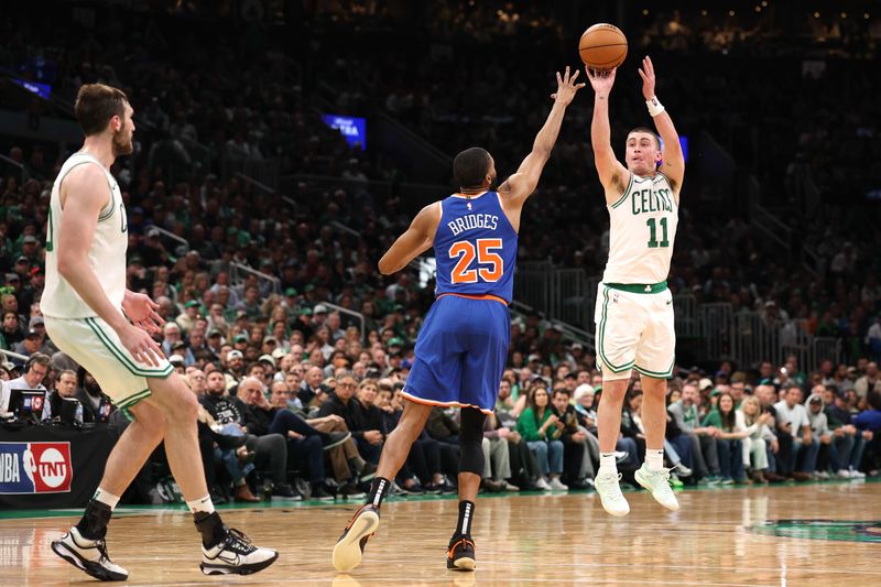 BOSTON, MASSACHUSETTS - MAY 05: Payton Pritchard #11 of the Boston Celtics shoots the ball against Mikal Bridges #25 of the New York Knicks during the third quarter in Game One of the Eastern Conference Second Round NBA Playoffs at TD Garden on May 05, 2025 in Boston, Massachusetts. NOTE TO USER: User expressly acknowledges and agrees that, by downloading and or using this photograph, User is consenting to the terms and conditions of the Getty Images License Agreement. (Photo by Maddie Meyer/Getty Images)