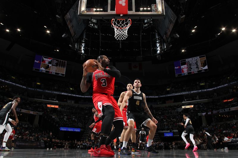 MEMPHIS, TN - FEBRUARY 8: Andre Drummond #3 of the Chicago Bulls handles the ball during the game against the Memphis Grizzlies on February 8, 2024 at FedExForum in Memphis, Tennessee. NOTE TO USER: User expressly acknowledges and agrees that, by downloading and or using this photograph, User is consenting to the terms and conditions of the Getty Images License Agreement. Mandatory Copyright Notice: Copyright 2024 NBAE (Photo by Joe Murphy/NBAE via Getty Images)