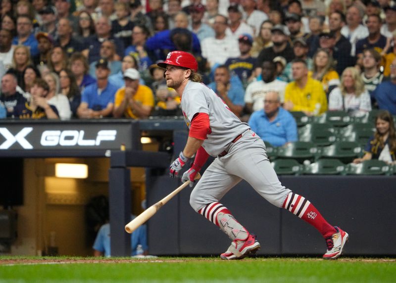 Sep 12, 2025; Milwaukee, Wisconsin, USA; St. Louis Cardinals second base Brendan Donovan (33) gets a base hit against the Milwaukee Brewers in the seventh inning at American Family Field. Mandatory Credit: Michael McLoone-Imagn Images