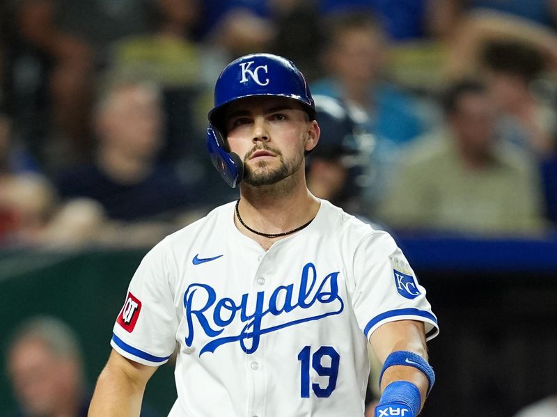 Aug 7, 2024; Kansas City, Missouri, USA; Kansas City Royals second baseman Michael Massey (19) throws his bat after striking out to end the eighth inning against the Boston Red Sox at Kauffman Stadium. Mandatory Credit: Jay Biggerstaff-USA TODAY Sports