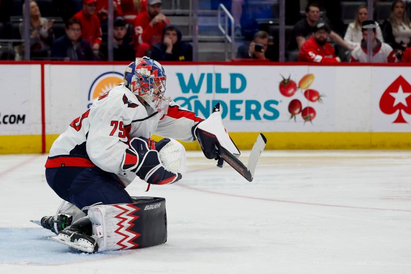 Apr 9, 2024; Detroit, Michigan, USA;  Washington Capitals goaltender Charlie Lindgren (79) makes a save in the second period against the Detroit Red Wings at Little Caesars Arena. Mandatory Credit: Rick Osentoski-USA TODAY Sports