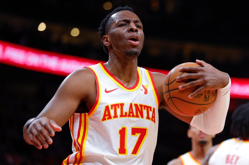 ATLANTA, GEORGIA - JANUARY 17:  Onyeka Okongwu #17 of the Atlanta Hawks reacts during the second quarter against the Orlando Magic at State Farm Arena on January 17, 2024 in Atlanta, Georgia. NOTE TO USER: User expressly acknowledges and agrees that, by downloading and or using this photograph, User is consenting to the terms and conditions of the Getty Images License Agreement. (Photo by Todd Kirkland/Getty Images)