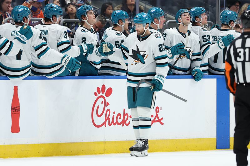 Jan 18, 2025; Elmont, New York, USA;  San Jose Sharks right wing Barclay Goodrow (23) celebrates his goal against the New York Islanders during the second period at UBS Arena. Mandatory Credit: Thomas Salus-Imagn Images