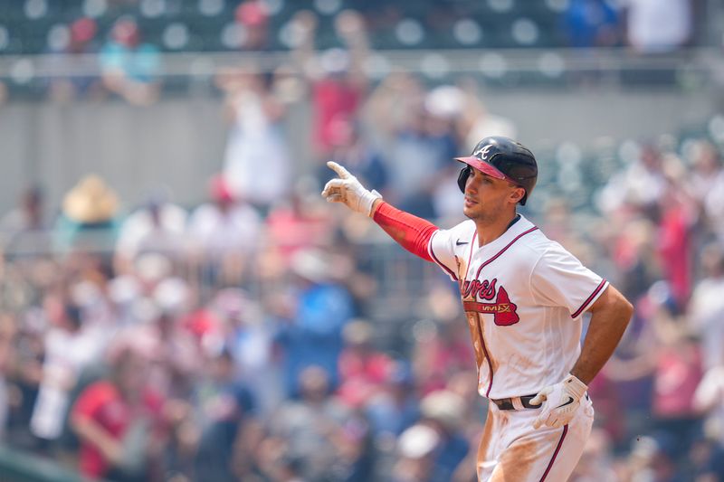 Aug 2, 2023; Cumberland, Georgia, USA; Atlanta Braves first baseman Matt Olson (28) reacts after hitting a home run against the Los Angeles Angels during the fourth inning at Truist Park. Mandatory Credit: Dale Zanine-USA TODAY Sports