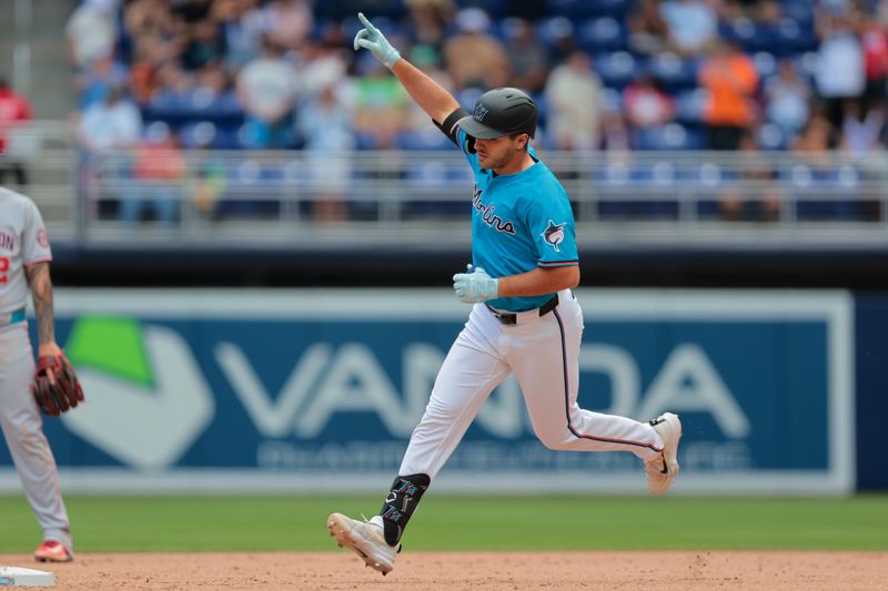 Apr 13, 2025; Miami, Florida, USA; Miami Marlins pinch hitter Matt Mervis (36) circles the bases after hitting a three-run home run against the Washington Nationals during the seventh inning at loanDepot Park. Mandatory Credit: Sam Navarro-Imagn Images