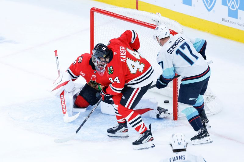 Nov 20, 2025; Chicago, Illinois, USA; Seattle Kraken left wing Jaden Schwartz (17) scores against the Chicago Blackhawks during the third period at United Center. Mandatory Credit: Kamil Krzaczynski-Imagn Images