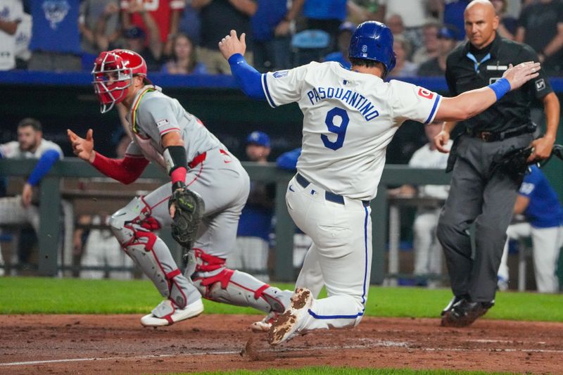 Aug 19, 2024; Kansas City, Missouri, USA; Los Angeles Angels first base Nolan Schanuel (18) can’t make a play as Kansas City Royals first base Vinnie Pasquantino (9) scores in the seventh inning at Kauffman Stadium. Mandatory Credit: Denny Medley-USA TODAY Sports