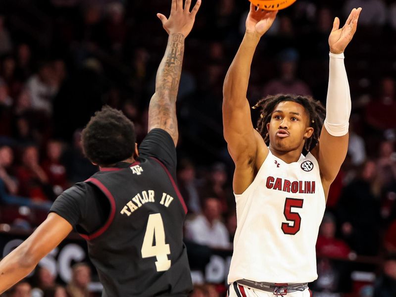 Jan 14, 2023; Columbia, South Carolina, USA; South Carolina Gamecocks guard Meechie Johnson (5) shoots over Texas A&M Aggies guard Wade Taylor IV (4) in the first half at Colonial Life Arena. Mandatory Credit: Jeff Blake-USA TODAY Sports