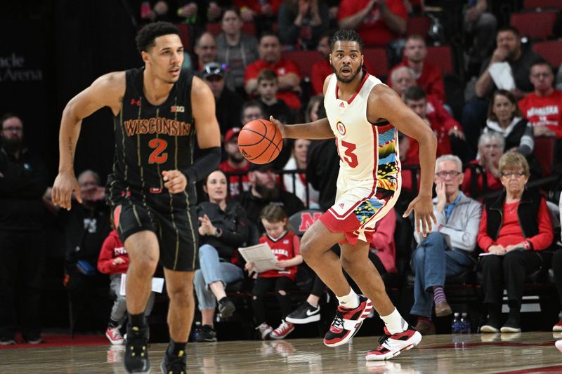 Feb 11, 2023; Lincoln, Nebraska, USA;  Nebraska Cornhuskers forward Derrick Walker (13) dribbles up court against the Wisconsin Badgers in the first half at Pinnacle Bank Arena. Mandatory Credit: Steven Branscombe-USA TODAY Sports