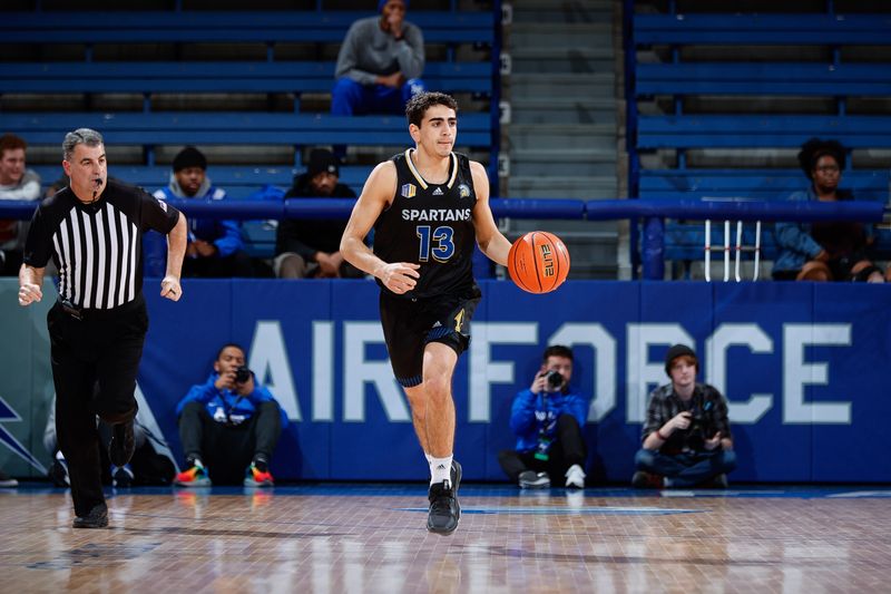 Mar 4, 2023; Colorado Springs, Colorado, USA; San Jose State Spartans guard Alvaro Cardenas (13) dribbles the ball up court in the first half against the Air Force Falcons at Clune Arena. Mandatory Credit: Isaiah J. Downing-USA TODAY Sports