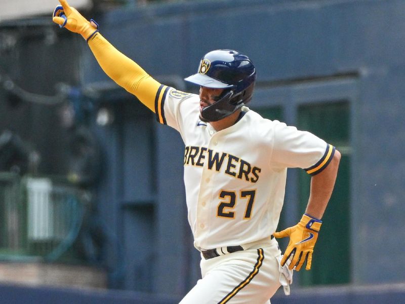 Aug 9, 2023; Milwaukee, Wisconsin, USA; Milwaukee Brewers shortstop Willy Adames (27) reacts after hitting a solo home run against the Colorado Rockies in the fifth inning at American Family Field. Mandatory Credit: Benny Sieu-USA TODAY Sports