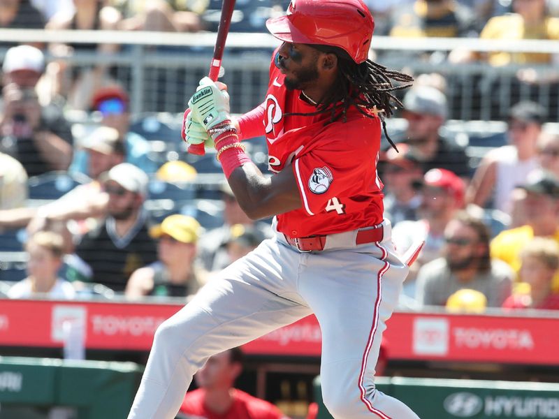 Aug 10, 2025; Pittsburgh, Pennsylvania, USA;  Cincinnati Reds shortstop Elly De La Cruz (44) hits RBI single against the Pittsburgh Pirates during the third inning at PNC Park. Mandatory Credit: Charles LeClaire-Imagn Images