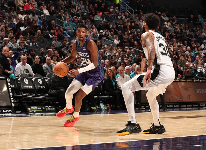 CHARLOTTE, NC - JANUARY 19: Brandon Miller #24 of the Charlotte Hornets handles the ball during the game against the San Antonio Spurs on January 19, 2024 at Spectrum Center in Charlotte, North Carolina. NOTE TO USER: User expressly acknowledges and agrees that, by downloading and or using this photograph, User is consenting to the terms and conditions of the Getty Images License Agreement. Mandatory Copyright Notice: Copyright 2024 NBAE (Photo by Kent Smith/NBAE via Getty Images)