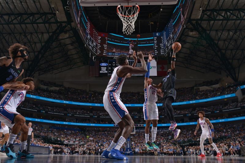 DALLAS, TX - MARCH 3: Kyrie Irving #11 of the Dallas Mavericks shoots the ball during the game against the Philadelphia 76ers on March 3, 2024 at the American Airlines Center in Dallas, Texas. NOTE TO USER: User expressly acknowledges and agrees that, by downloading and or using this photograph, User is consenting to the terms and conditions of the Getty Images License Agreement. Mandatory Copyright Notice: Copyright 2024 NBAE (Photo by Glenn James/NBAE via Getty Images)