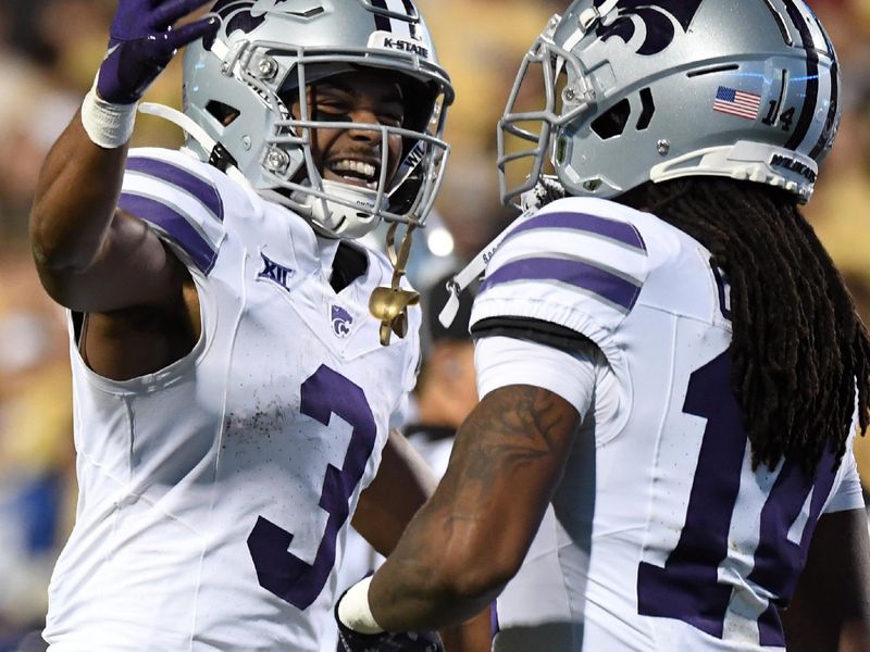 Oct 12, 2024; Boulder, Colorado, USA; Kansas State Wildcats running back Dylan Edwards (3) celebrates with teammates after a touchdown during the first half against the Colorado Buffaloes at Folsom Field. Mandatory Credit: Christopher Hanewinckel-Imagn Images