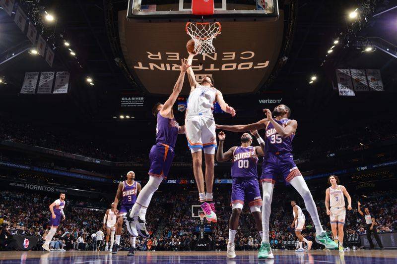 PHOENIX, AZ - MARCH 3: Chet Holmgren #7 of the Oklahoma City Thunder dunks the ball during the game against the Phoenix Suns on March 3, 2024 at Footprint Center in Phoenix, Arizona. NOTE TO USER: User expressly acknowledges and agrees that, by downloading and or using this photograph, user is consenting to the terms and conditions of the Getty Images License Agreement. Mandatory Copyright Notice: Copyright 2024 NBAE (Photo by Barry Gossage/NBAE via Getty Images)