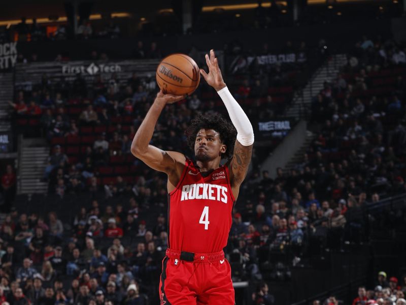 PORTLAND, OR - MARCH 8:  Jalen Green #4 of the Houston Rockets shoots a 3-point basket during the game  on March 8, 2024 at the Moda Center Arena in Portland, Oregon. NOTE TO USER: User expressly acknowledges and agrees that, by downloading and or using this photograph, user is consenting to the terms and conditions of the Getty Images License Agreement. Mandatory Copyright Notice: Copyright 2024 NBAE (Photo by Cameron Browne/NBAE via Getty Images)