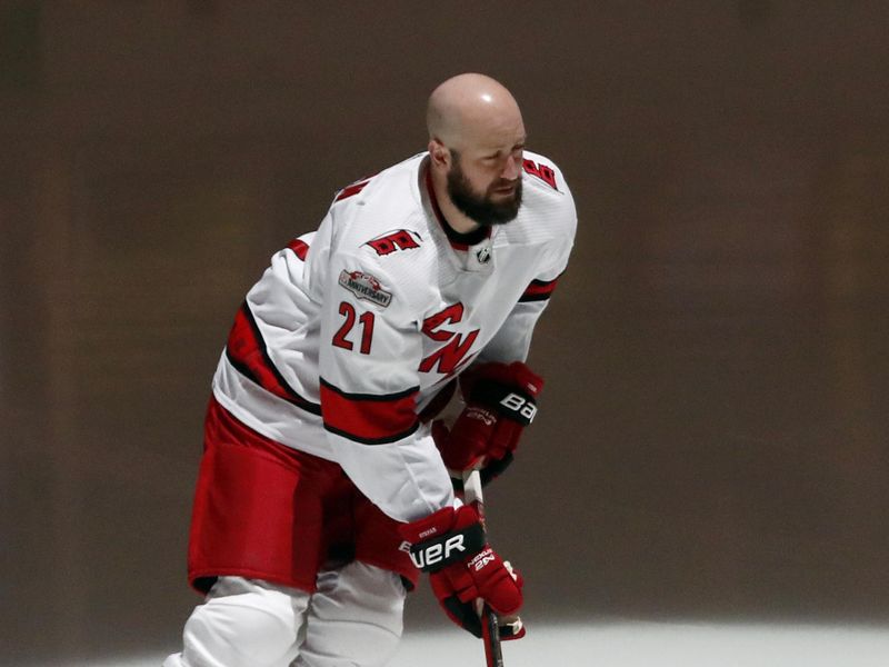 Nov 29, 2022; Pittsburgh, Pennsylvania, USA; Carolina Hurricanes center Derek Stepan (21) takes the ice to warm up before the game against the Pittsburgh Penguins at PPG Paints Arena. Mandatory Credit: Charles LeClaire-USA TODAY Sports