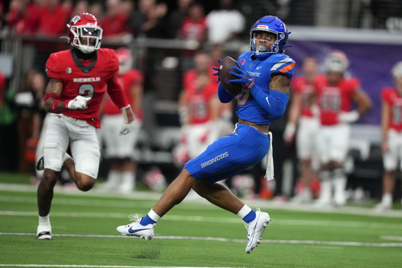 Dec 2, 2023; Las Vegas, NV, USA; Boise State Broncos wide receiver Billy Bowens (18) catches the ball against the UNLV Rebels in the first half during the Mountain West Championship at Allegiant Stadium. Mandatory Credit: Kirby Lee-USA TODAY Sports