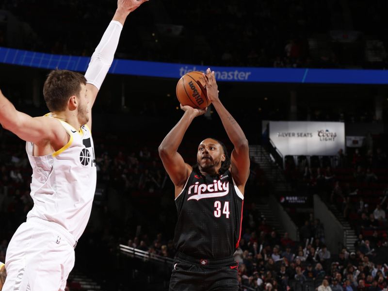 PORTLAND, OR - DECEMBER 6: Jabari Walker #34 of the Portland Trail Blazers shoots the ball during the game against the Utah Jazz on December 6, 2024 at the Moda Center Arena in Portland, Oregon. NOTE TO USER: User expressly acknowledges and agrees that, by downloading and or using this photograph, user is consenting to the terms and conditions of the Getty Images License Agreement. Mandatory Copyright Notice: Copyright 2024 NBAE (Photo by Cameron Browne/NBAE via Getty Images)