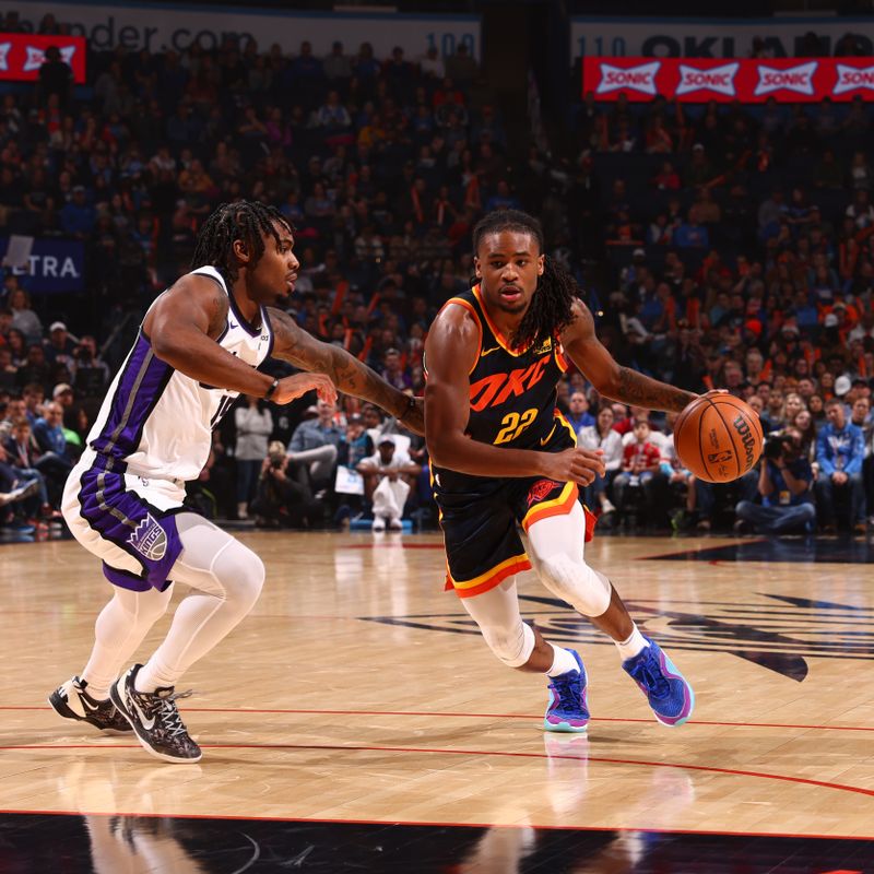 OKLAHOMA CITY, OK - FEBRUARY 11: Cason Wallace #22 of the Oklahoma City Thunder  dribbles the ball during the game against the Sacramento Kings on February 11, 2024 at Paycom Arena in Oklahoma City, Oklahoma. NOTE TO USER: User expressly acknowledges and agrees that, by downloading and or using this photograph, User is consenting to the terms and conditions of the Getty Images License Agreement. Mandatory Copyright Notice: Copyright 2024 NBAE (Photo by Zach Beeker/NBAE via Getty Images)