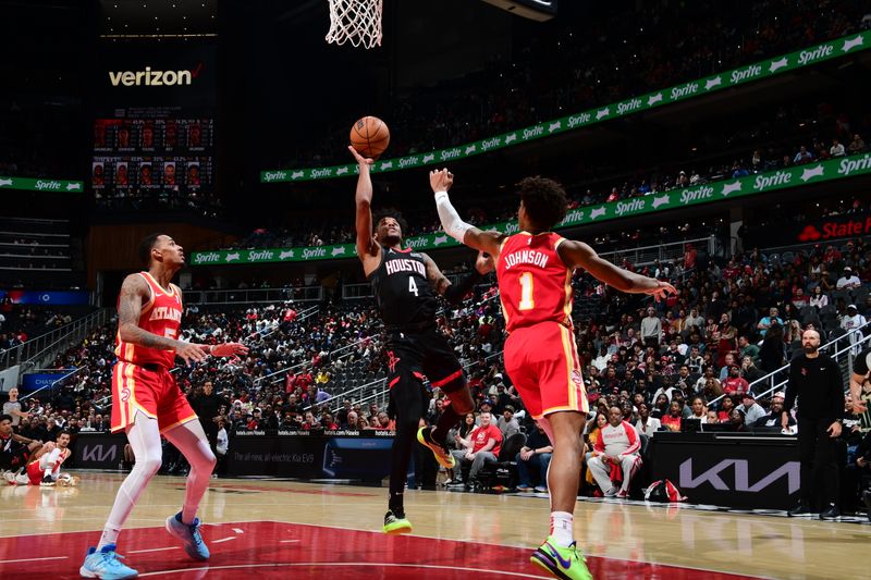 ATLANTA, GA - FEBRUARY 10: Jalen Green #4 of the Houston Rockets drives to the basket during the game against the Atlanta Hawks on February 10, 2024 at State Farm Arena in Atlanta, Georgia.  NOTE TO USER: User expressly acknowledges and agrees that, by downloading and/or using this Photograph, user is consenting to the terms and conditions of the Getty Images License Agreement. Mandatory Copyright Notice: Copyright 2024 NBAE (Photo by Scott Cunningham/NBAE via Getty Images)