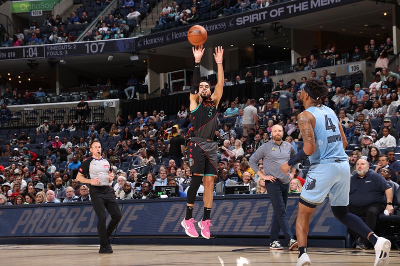 MEMPHIS, TN - MARCH 12: Tyus Jones #5 of the Washington Wizards shoots the ball during the gameagainst the Memphis Grizzlies on March 12, 2024 at FedExForum in Memphis, Tennessee. NOTE TO USER: User expressly acknowledges and agrees that, by downloading and or using this photograph, User is consenting to the terms and conditions of the Getty Images License Agreement. Mandatory Copyright Notice: Copyright 2024 NBAE (Photo by Joe Murphy/NBAE via Getty Images)