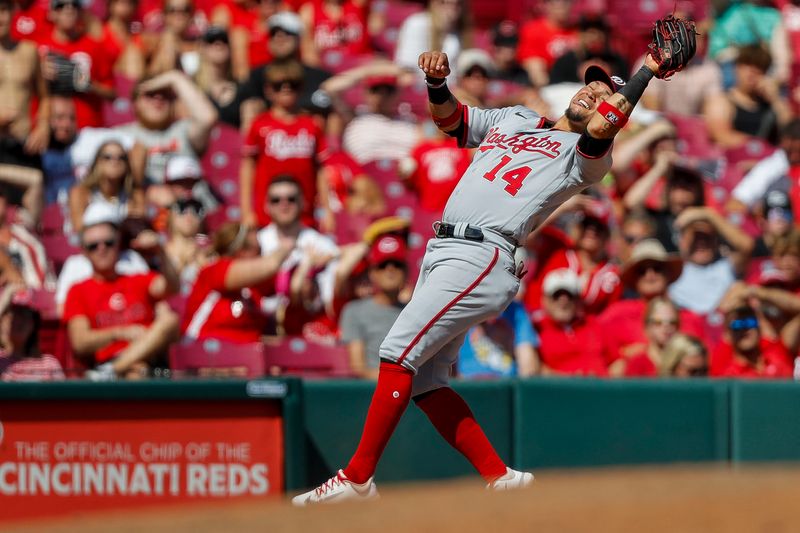 Aug 6, 2023; Cincinnati, Ohio, USA; Washington Nationals third baseman Ildemaro Vargas (14) catches a pop up hit by Cincinnati Reds center fielder TJ Friedl (not pictured) in the eighth inning at Great American Ball Park. Mandatory Credit: Katie Stratman-USA TODAY Sports