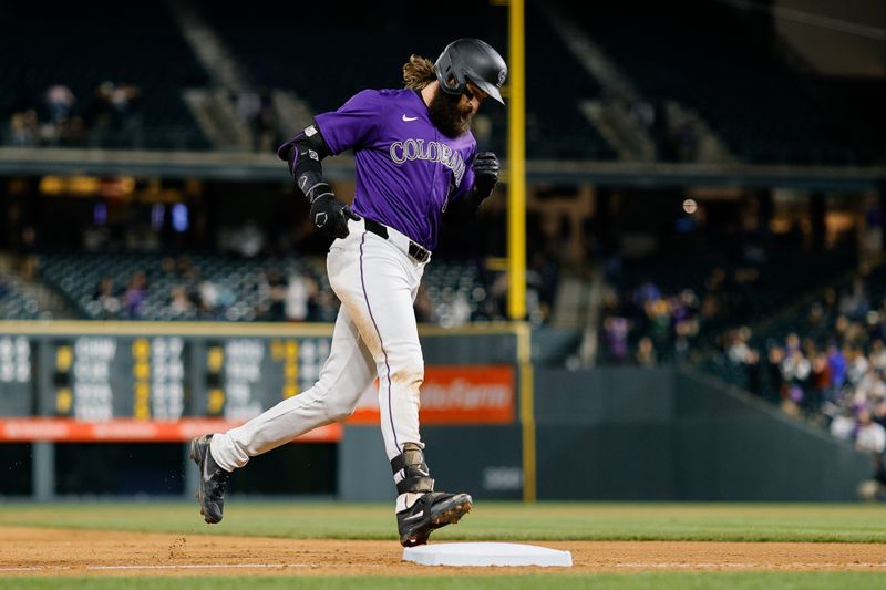 Apr 8, 2024; Denver, Colorado, USA; Colorado Rockies designated hitter Charlie Blackmon (19) rounds the bases on a solo home run in the eighth inning against the Arizona Diamondbacks at Coors Field. Mandatory Credit: Isaiah J. Downing-USA TODAY Sports