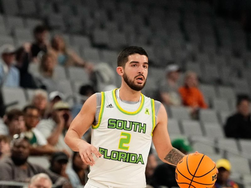 Mar 16, 2024; Fort Worth, TX, USA;  South Florida Bulls guard Jose Placer (2) controls the ball against the UAB Blazers during the first half at Dickies Arena. Mandatory Credit: Chris Jones-USA TODAY Sports