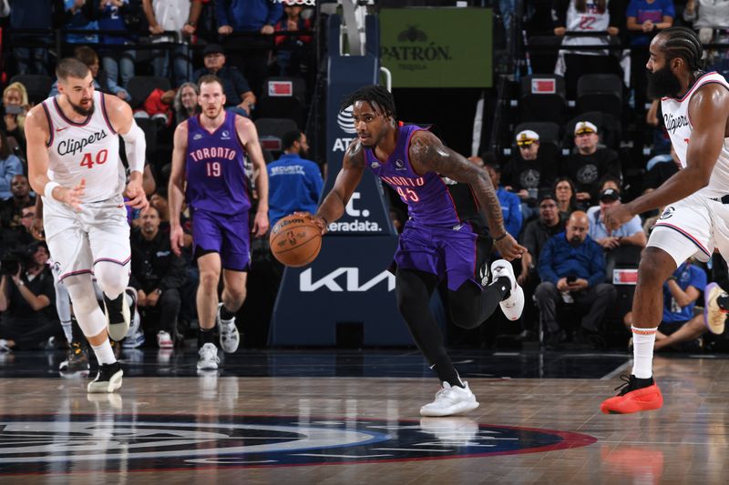 INGLEWOOD, CA - NOVEMBER 9: Davion Mitchell #45 of the Toronto Raptors dribbles the ball during the game against the LA Clippers on November 9, 2024 at Intuit Dome in Los Angeles, California. NOTE TO USER: User expressly acknowledges and agrees that, by downloading and/or using this Photograph, user is consenting to the terms and conditions of the Getty Images License Agreement. Mandatory Copyright Notice: Copyright 2024 NBAE (Photo by Noah Graham/NBAE via Getty Images)