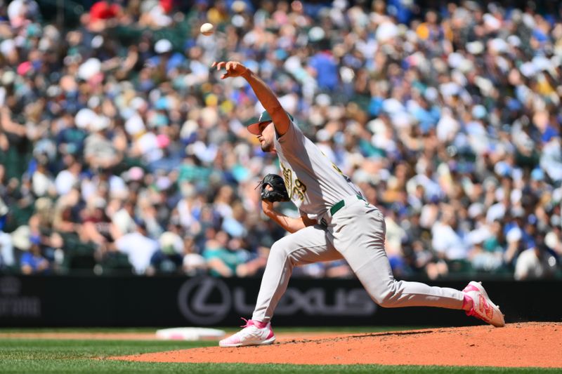 May 12, 2024; Seattle, Washington, USA; Oakland Athletics relief pitcher Kyle Muller (39) pitches to the Oakland Athletics during the third inning at T-Mobile Park. Mandatory Credit: Steven Bisig-USA TODAY Sports