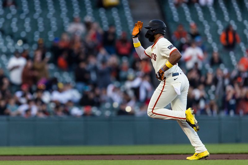 Sep 11, 2024; San Francisco, California, USA; San Francisco Giants designated hitter Jerar Encarnacion (59) gestures as he runs the bases after hitting a two-run home run against the Milwaukee Brewers during the first inning at Oracle Park. Mandatory Credit: John Hefti-Imagn Images