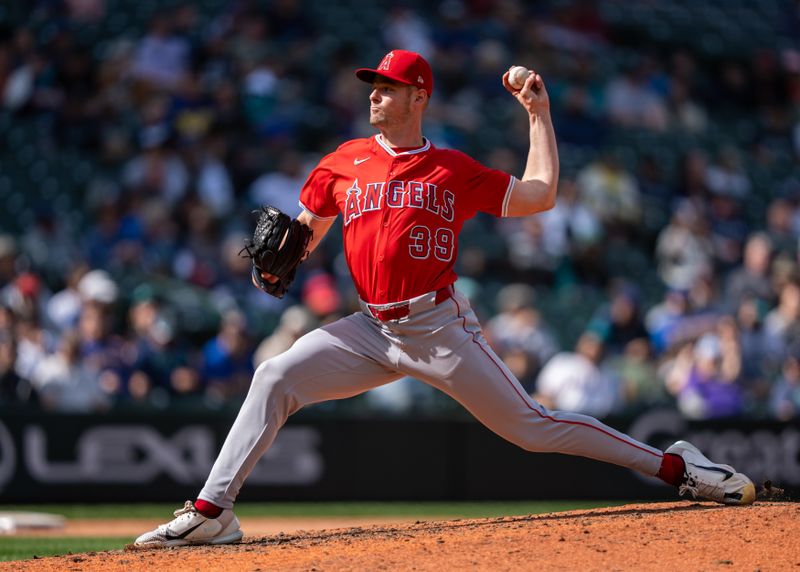 Apr 30, 2025; Seattle, Washington, USA;  Los Angeles Angels reliever Jake Eder (39) delivers a pitch during the eighth inning against the Seattle Mariners at T-Mobile Park. Mandatory Credit: Stephen Brashear-Imagn Images
