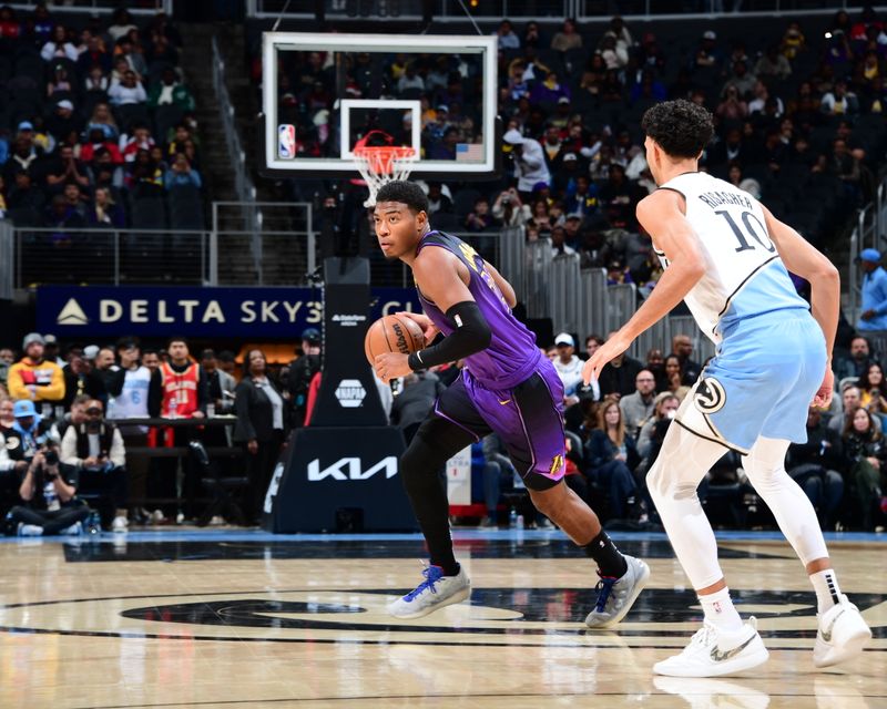 ATLANTA, GA - DECEMBER 6: Rui Hachimura #28 of the Los Angeles Lakers handles the ball during the game against the Atlanta Hawks on December 6, 2024 at State Farm Arena in Atlanta, Georgia.  NOTE TO USER: User expressly acknowledges and agrees that, by downloading and/or using this Photograph, user is consenting to the terms and conditions of the Getty Images License Agreement. Mandatory Copyright Notice: Copyright 2024 NBAE (Photo by Scott Cunningham/NBAE via Getty Images)