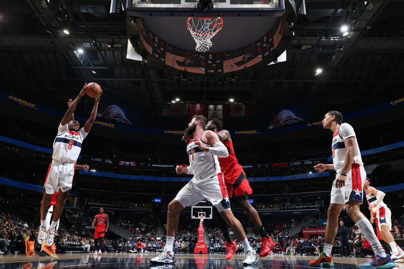 WASHINGTON, DC -? OCTOBER 11: Carlton Carrington #8 of the Washington Wizards rebounds the ball during the game against the Toronto Raptors during a NBA preseason game on October 11, 2024 at Capital One Arena in Washington, DC. NOTE TO USER: User expressly acknowledges and agrees that, by downloading and or using this Photograph, user is consenting to the terms and conditions of the Getty Images License Agreement. Mandatory Copyright Notice: Copyright 2024 NBAE (Photo by Stephen Gosling/NBAE via Getty Images)