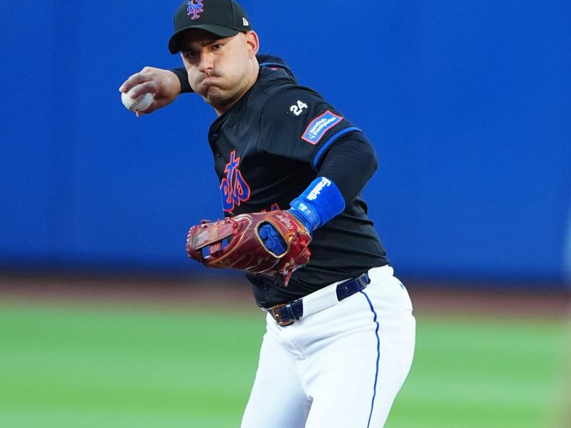 Jul 10, 2024; New York City, New York, USA; New York Mets second baseman Jose Iglesias (11) throws out Washington Nationals catcher Keibert Ruiz (not pictured) after fielding a ground ball during the first inning at Citi Field. Mandatory Credit: Gregory Fisher-USA TODAY Sports