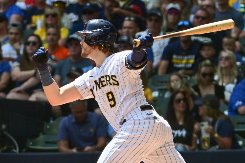 May 28, 2023; Milwaukee, Wisconsin, USA; Milwaukee Brewers third baseman Brian Anderson (9) hits a two RBI double against the San Francisco Giants in the first inning at American Family Field. Mandatory Credit: Benny Sieu-USA TODAY Sports