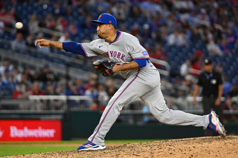 Apr 26, 2025; Washington, District of Columbia, USA; New York Mets pitcher Edwin Díaz (39) throws to the Washington Nationals during the ninth inning at Nationals Park. Mandatory Credit: Brad Mills-Imagn Images