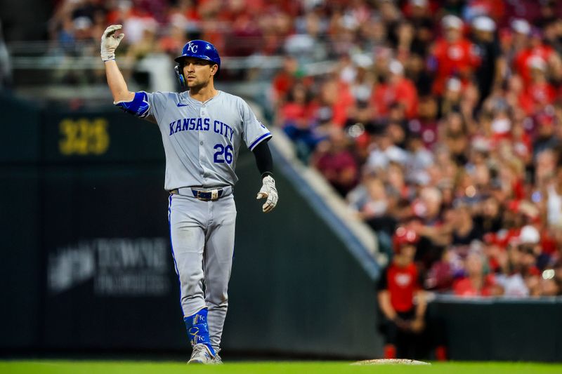 Aug 16, 2024; Cincinnati, Ohio, USA; Kansas City Royals outfielder Adam Frazier (26) reacts after hitting a RBI single in the sixth inning against the Cincinnati Reds at Great American Ball Park. Mandatory Credit: Katie Stratman-USA TODAY Sports