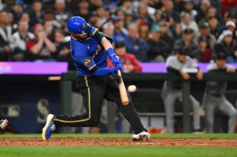 Apr 26, 2024; Seattle, Washington, USA; Seattle Mariners right fielder Mitch Haniger (17) hits a grand slam against the Arizona Diamondbacks during the sixth inning at T-Mobile Park. Mandatory Credit: Steven Bisig-USA TODAY Sports