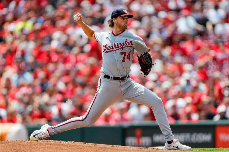 Aug 6, 2023; Cincinnati, Ohio, USA; Washington Nationals starting pitcher Jake Irvin (74) pitches against the Cincinnati Reds in the first inning at Great American Ball Park. Mandatory Credit: Katie Stratman-USA TODAY Sports