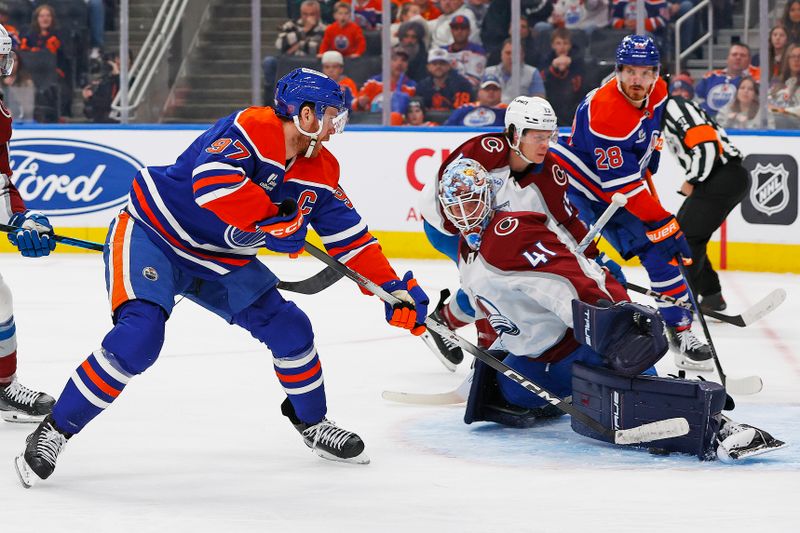 Nov 8, 2025; Edmonton, Alberta, CAN; Colorado Avalanche goaltender Scott Wedgewood (41) makes a save on Edmonton Oilers forward Connor McDavid (97) during the third period at Rogers Place. Mandatory Credit: Perry Nelson-Imagn Images