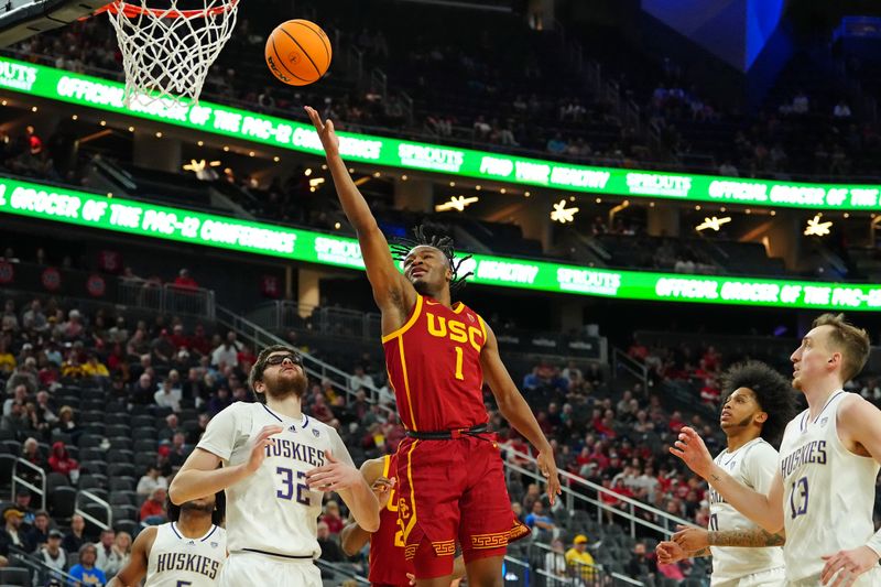 Mar 13, 2024; Las Vegas, NV, USA; USC Trojans guard Isaiah Collier (1) shoots over Washington Huskies forward Wilhelm Breidenbach (32) during the second half at T-Mobile Arena. Mandatory Credit: Stephen R. Sylvanie-USA TODAY Sports